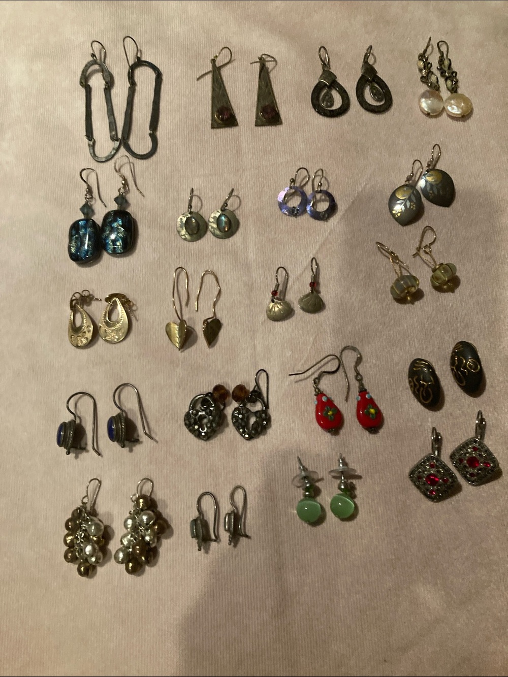 Assorted earrings some silver and some gold with color and semi precious stones